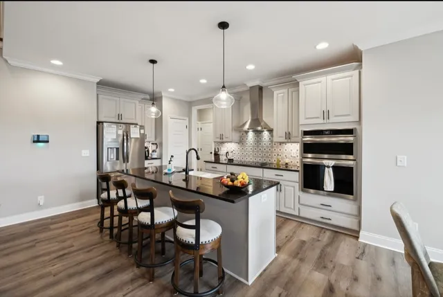 a white bath tub sitting in a bathroom