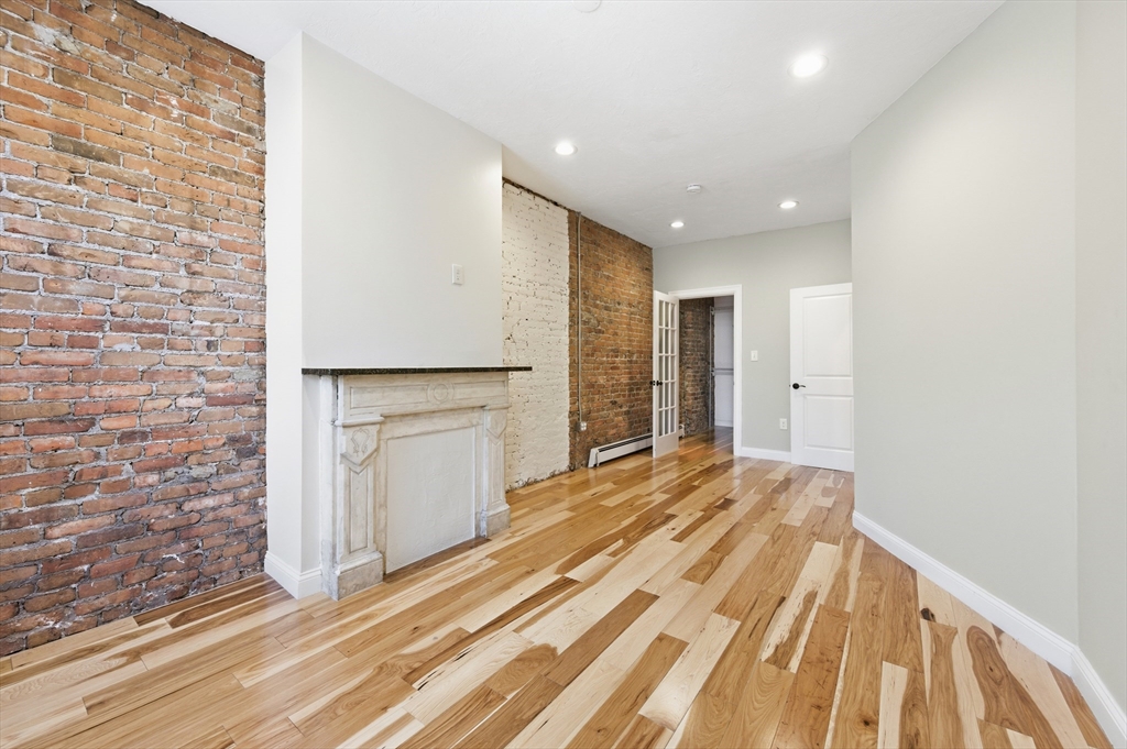 54 Beacon Street, Unit 2 Chelsea, MA 02150 - Photo 16 of 26 a view of an empty room with closet and entryway