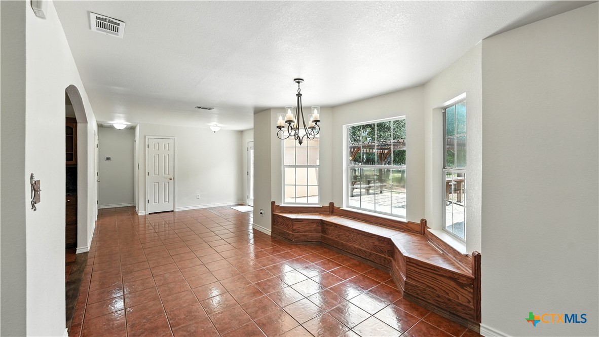 220 Lanier Ranch Road Driftwood, TX 78619 - Photo 16 of 48 a view of an empty room with a window