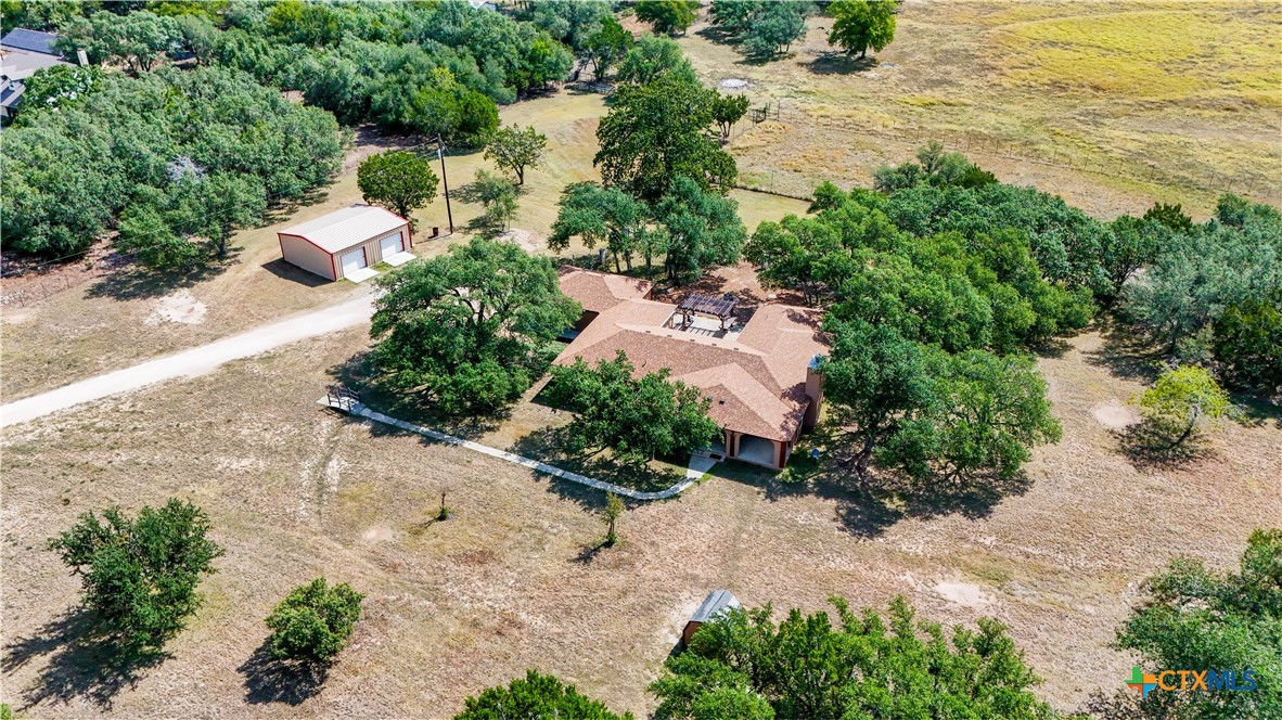 220 Lanier Ranch Road Driftwood, TX 78619 - Photo 45 of 48 a view of a lake with beach and outdoor space