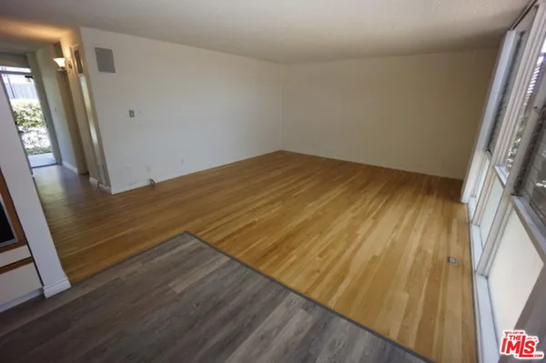 a view of wooden floor and staircase