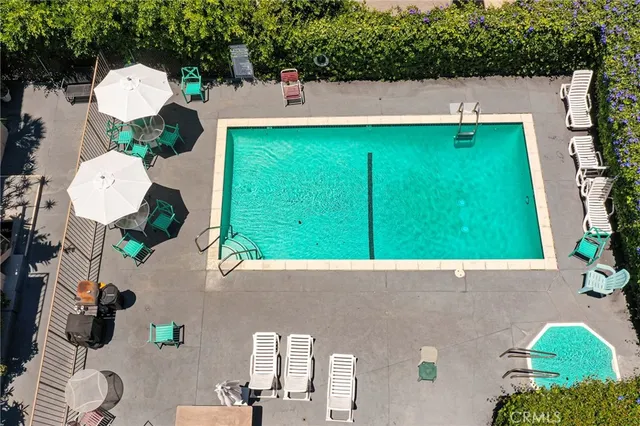 a room with cabinets and washer dryer