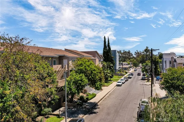 an aerial view of a house with a ocean view