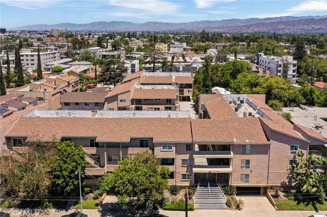 an aerial view of a city with lots of residential buildings