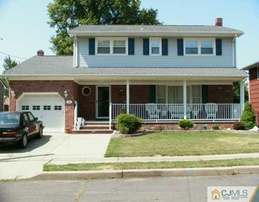 33 South Cliff Road Colonia, NJ 07067 - Photo 1 of 7 a view of a house with a swimming pool