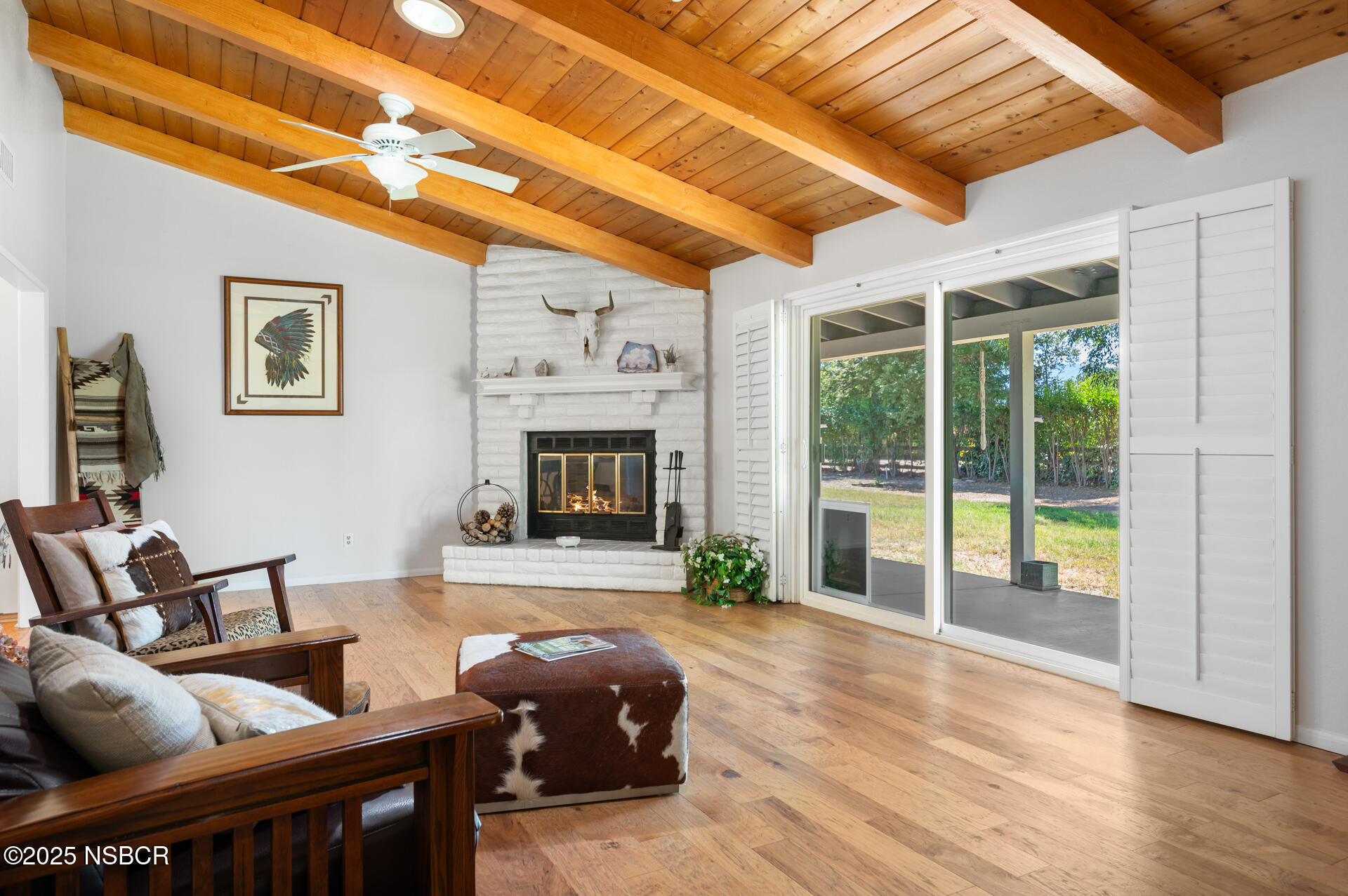 1011 North Refugio Road Santa Ynez, CA 93463 - Photo 12 of 48 a living room with furniture and a fireplace