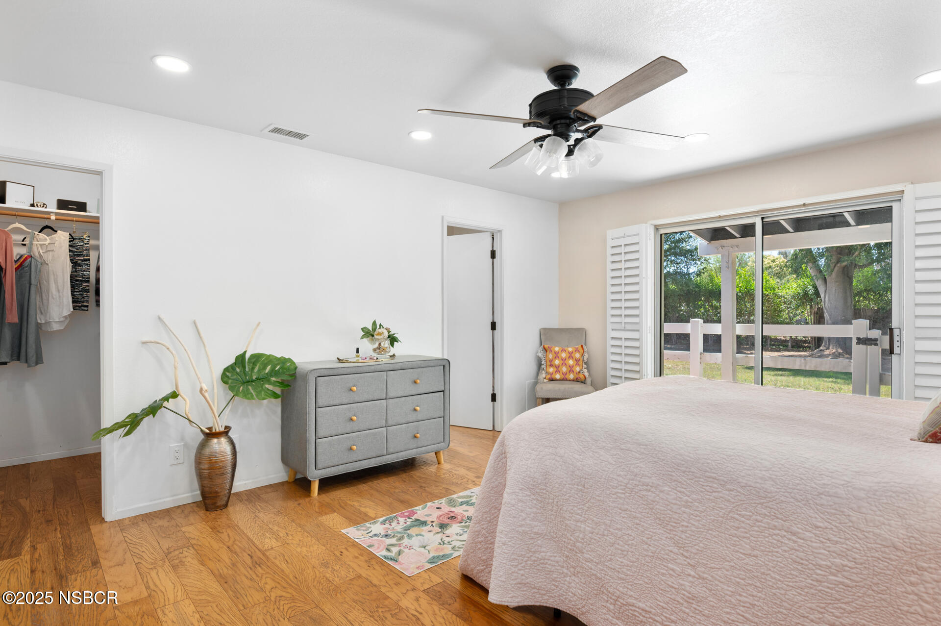 1011 North Refugio Road Santa Ynez, CA 93463 - Photo 16 of 48 a bed room with a bed and a large window