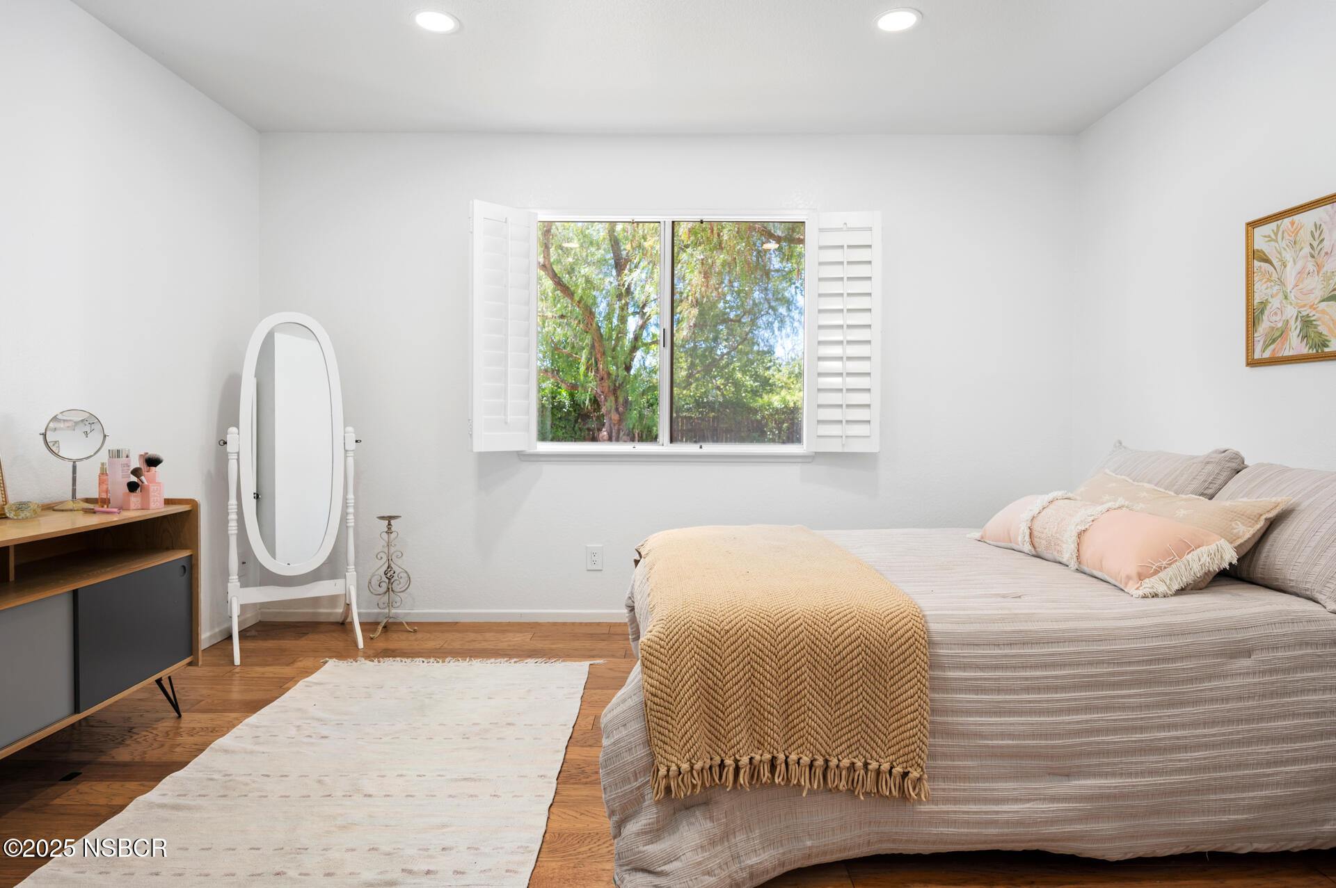 1011 North Refugio Road Santa Ynez, CA 93463 - Photo 20 of 48 a bedroom with a bed a dresser and next to a window