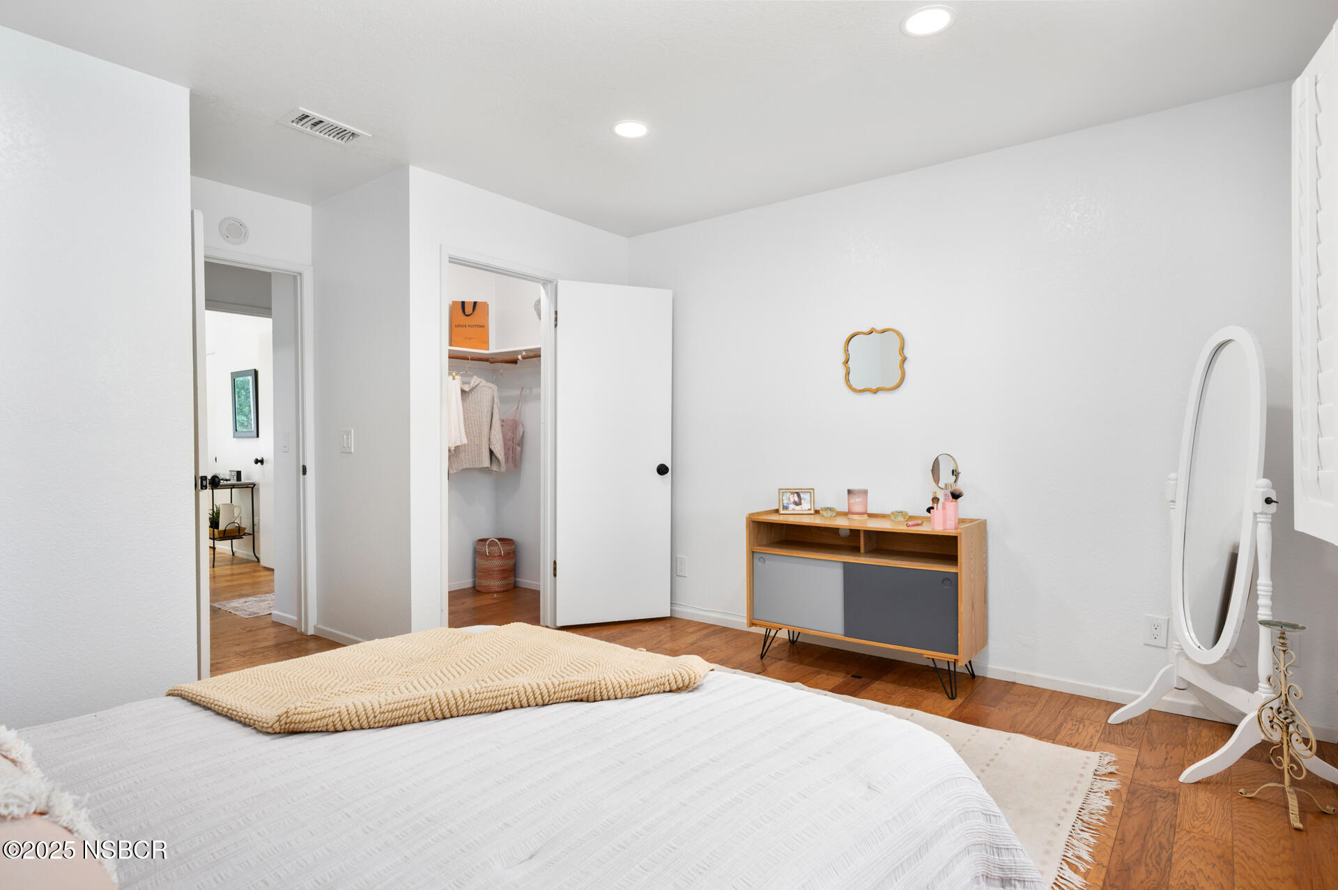 1011 North Refugio Road Santa Ynez, CA 93463 - Photo 21 of 48 a bedroom with a bed and a dresser