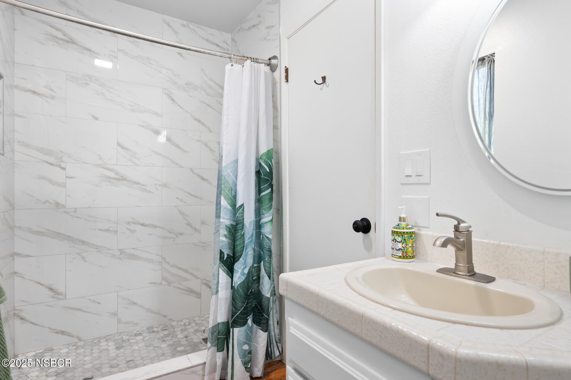 1011 North Refugio Road Santa Ynez, CA 93463 - Photo 22 of 48 a bathroom with a sink and a mirror