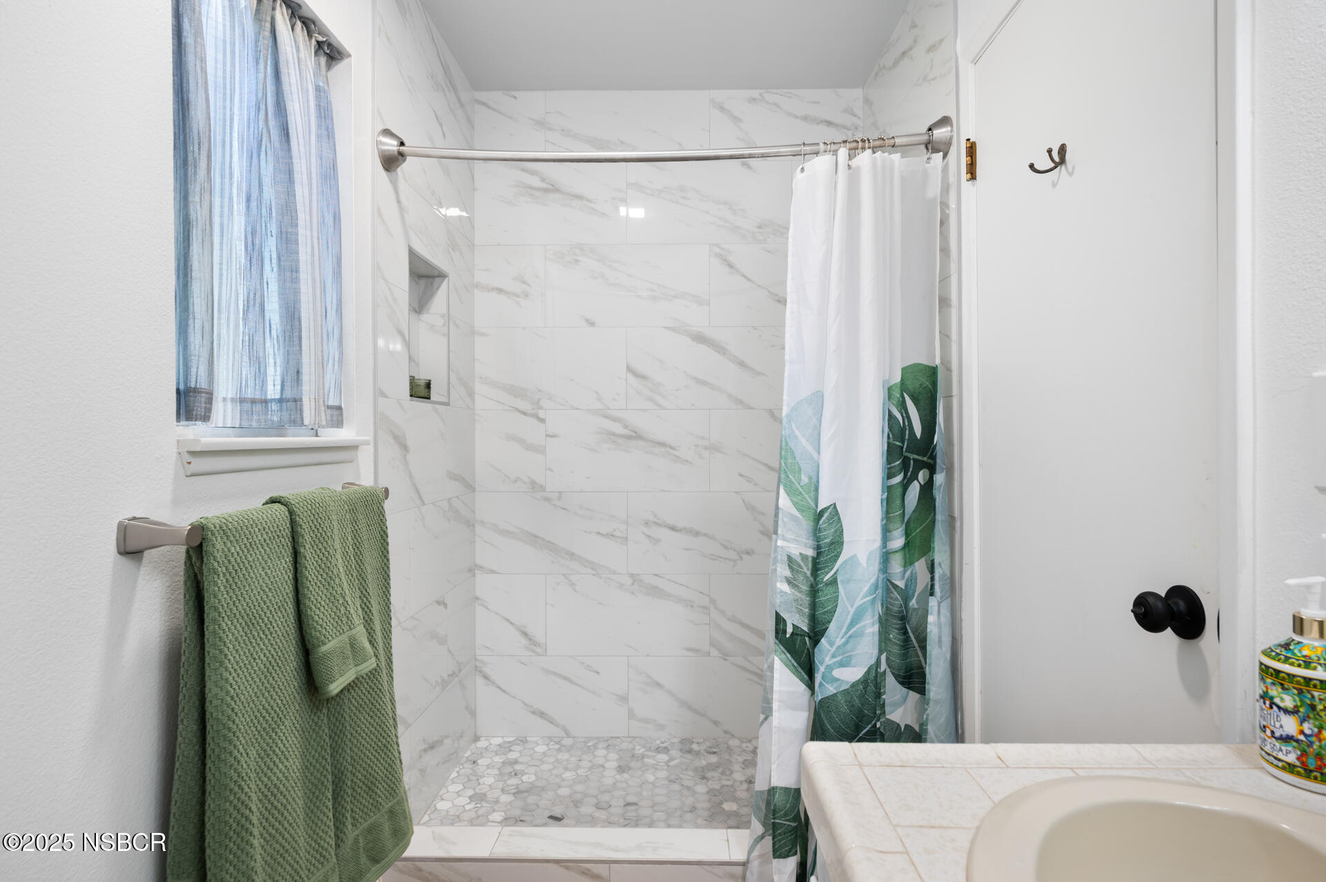 1011 North Refugio Road Santa Ynez, CA 93463 - Photo 23 of 48 a bathroom with a shower and a tub