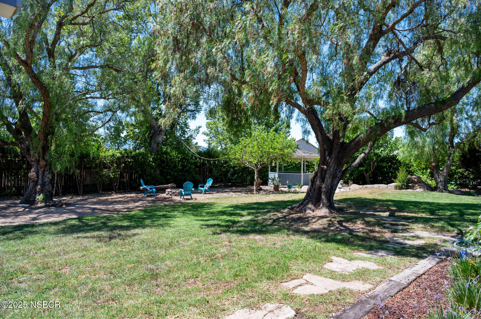 1011 North Refugio Road Santa Ynez, CA 93463 - Photo 35 of 48 a view of a backyard with tree s