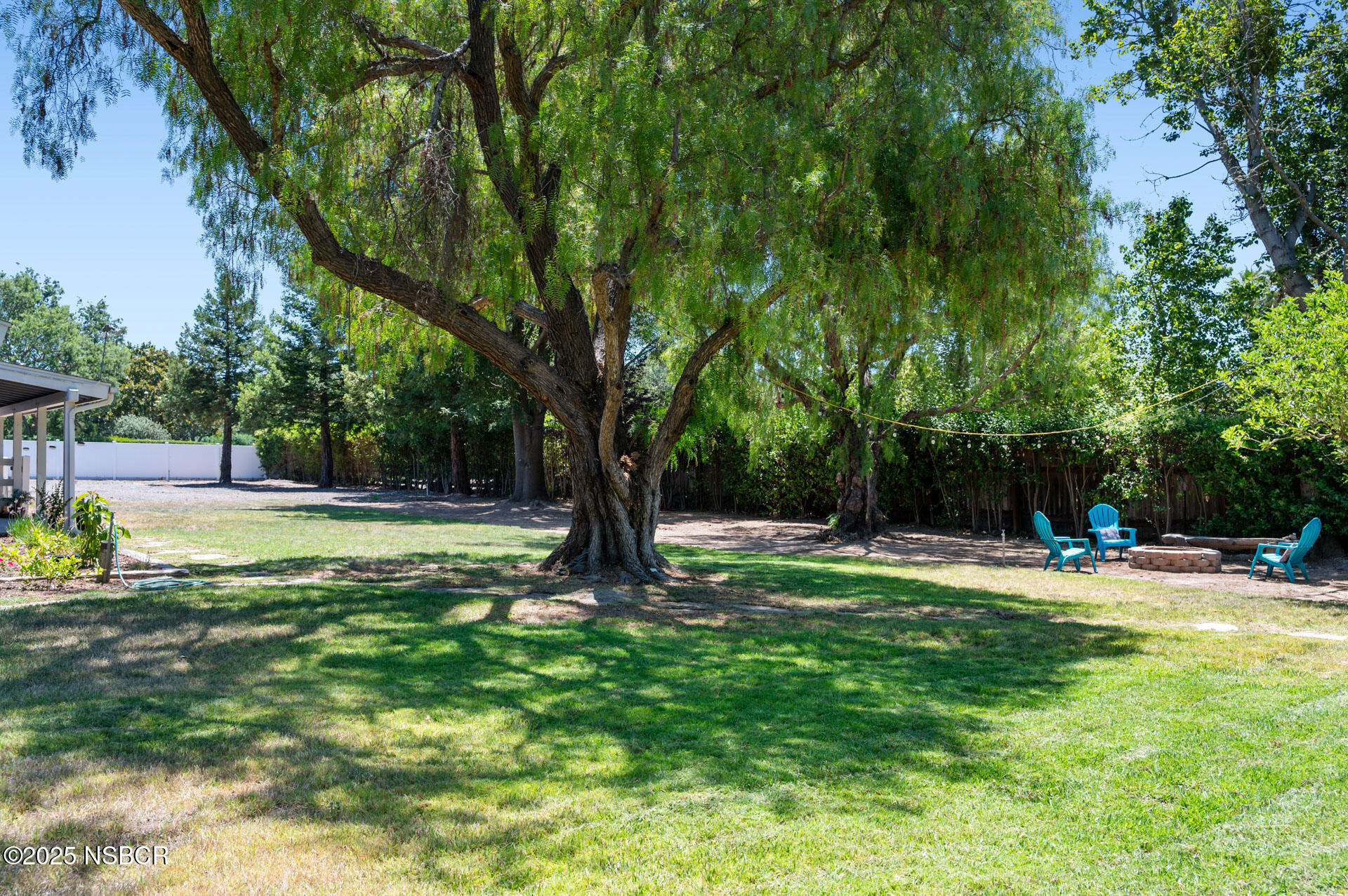1011 North Refugio Road Santa Ynez, CA 93463 - Photo 36 of 48 a view of a backyard with a small cabin