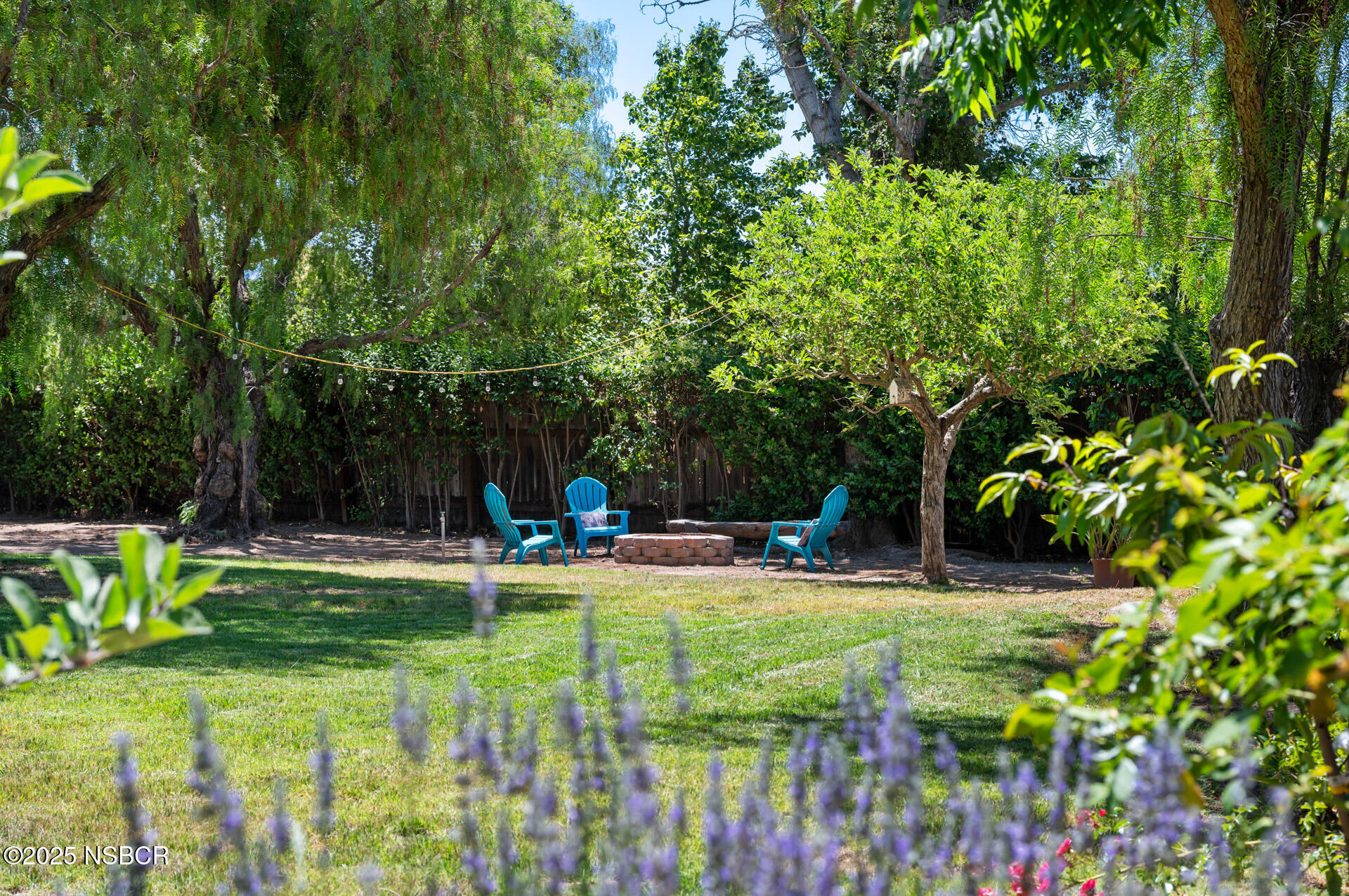 1011 North Refugio Road Santa Ynez, CA 93463 - Photo 39 of 48 a view of a house with a backyard and sitting area