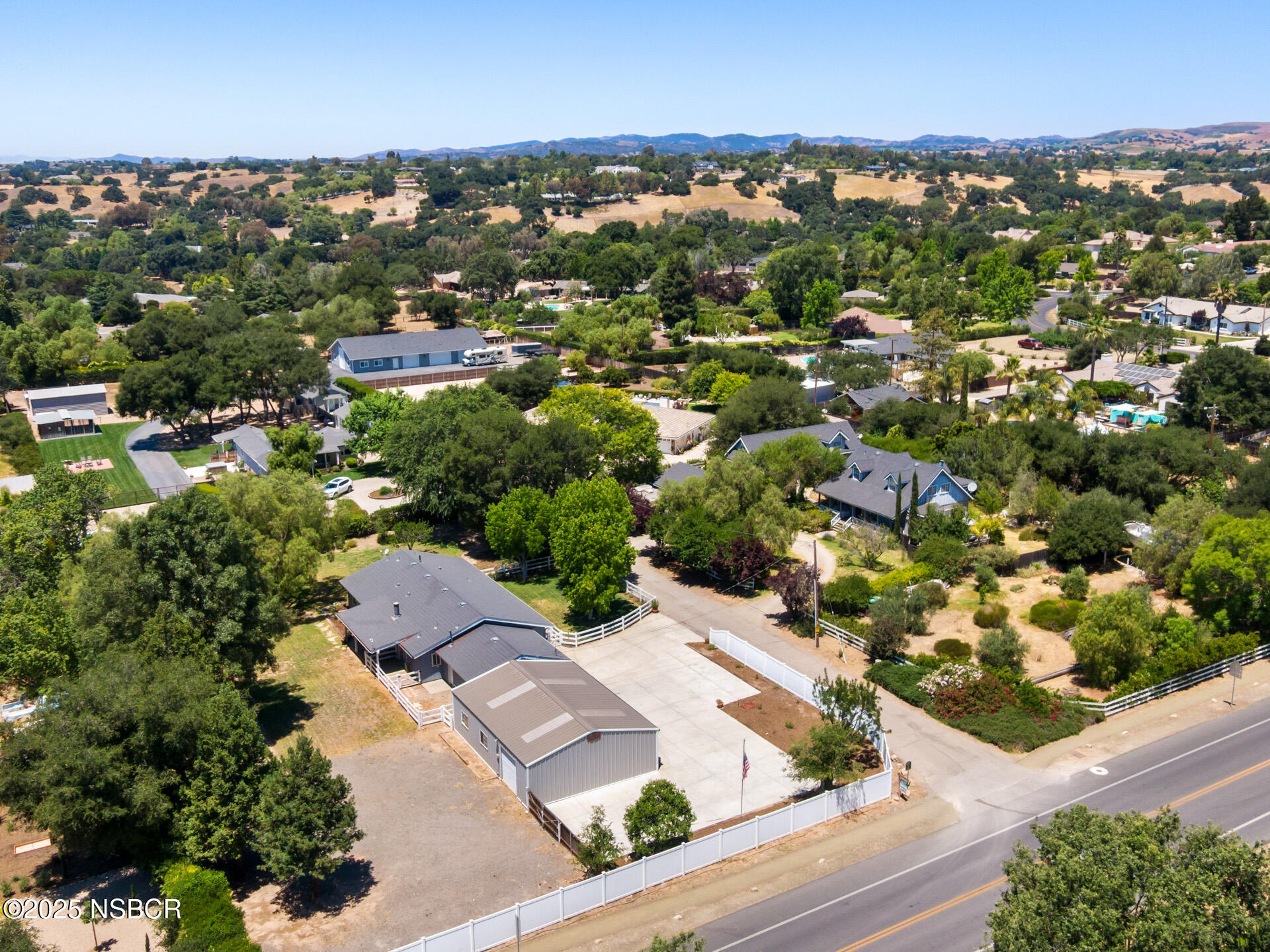 1011 North Refugio Road Santa Ynez, CA 93463 - Photo 46 of 48 an aerial view of residential houses with outdoor space and trees