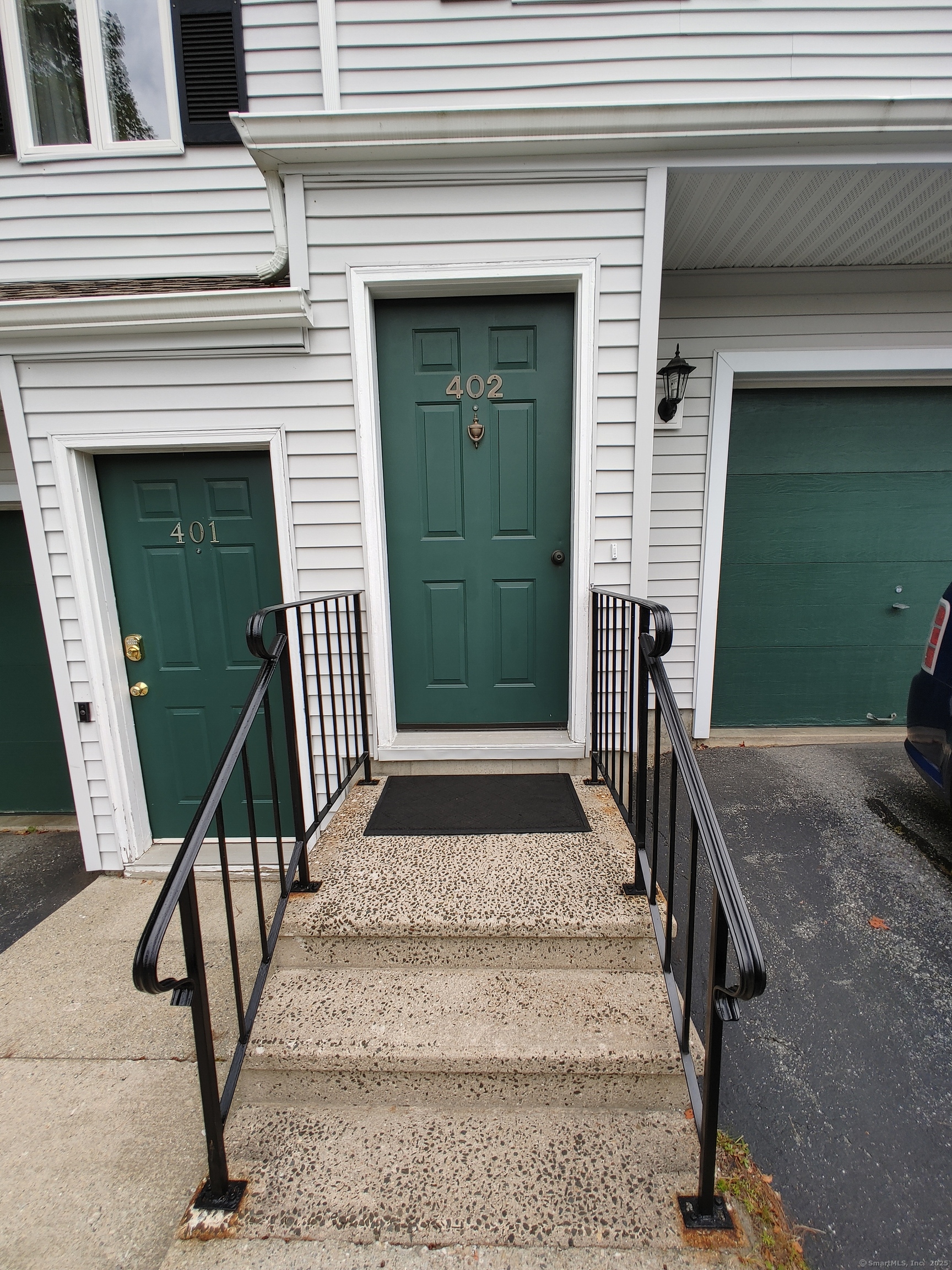 402 Whetstone Mills, Unit 402 Dayville, CT 06241 - Photo 1 of 21 a front view of a house