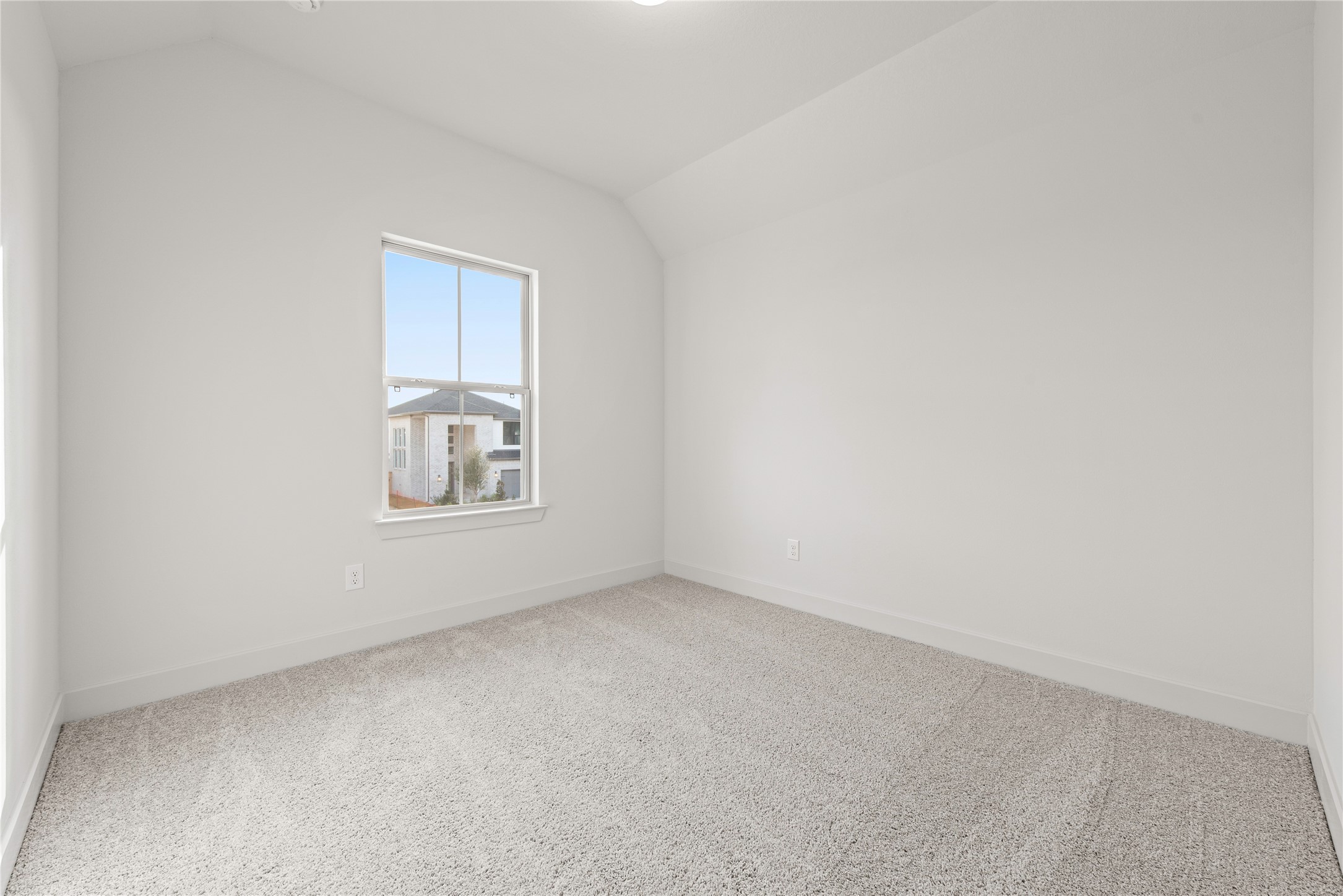 206 Sierra Stream Lane Conroe, TX 77304 - Photo 14 of 28 a view of an empty room with a window