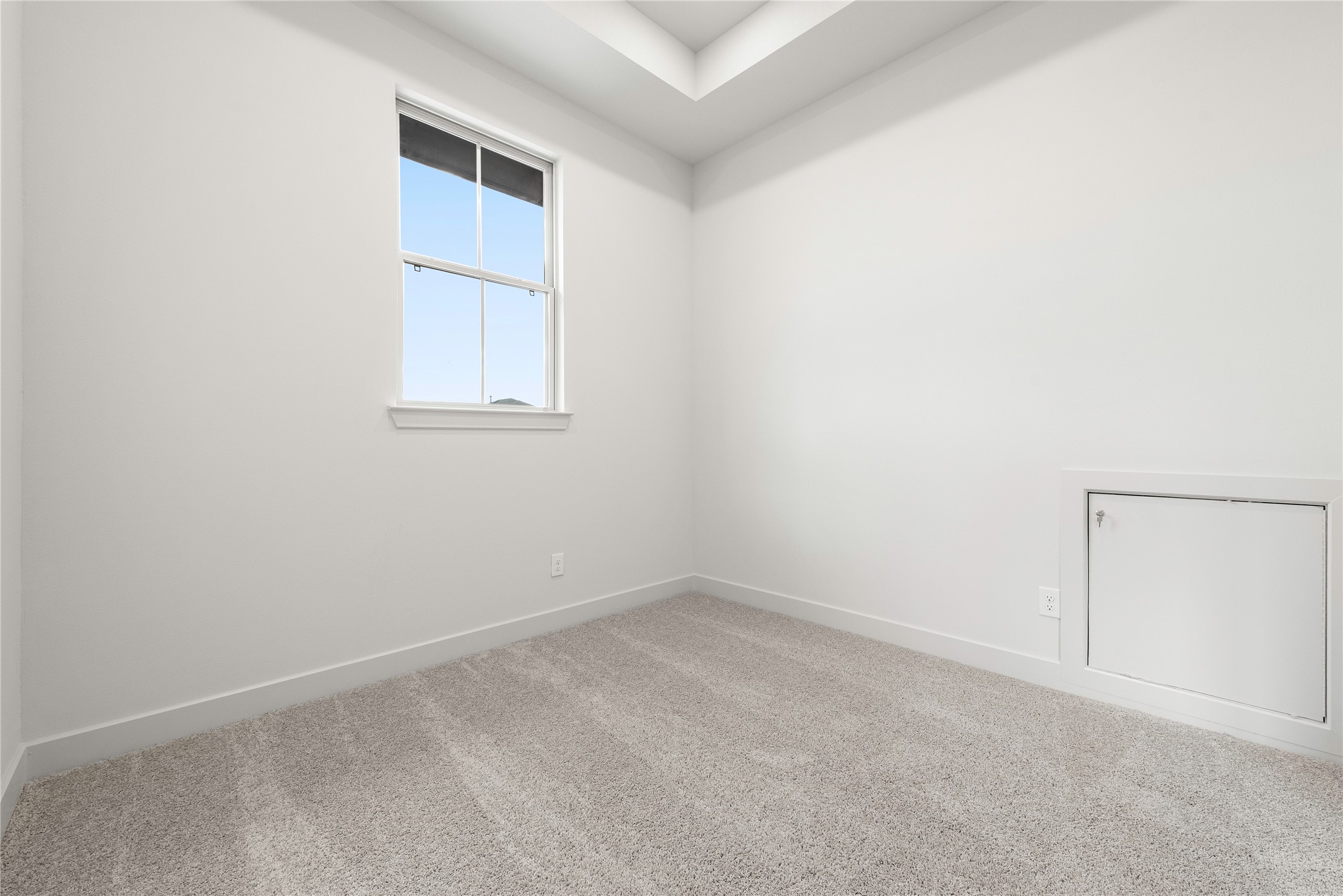 206 Sierra Stream Lane Conroe, TX 77304 - Photo 17 of 28 an empty room with a window