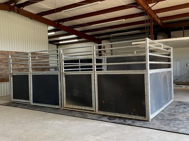 a view of an empty room with wooden walls