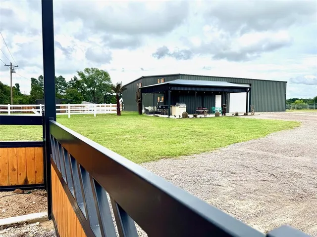 a view of a backyard with a garden