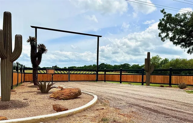 a view of swimming pool with furniture