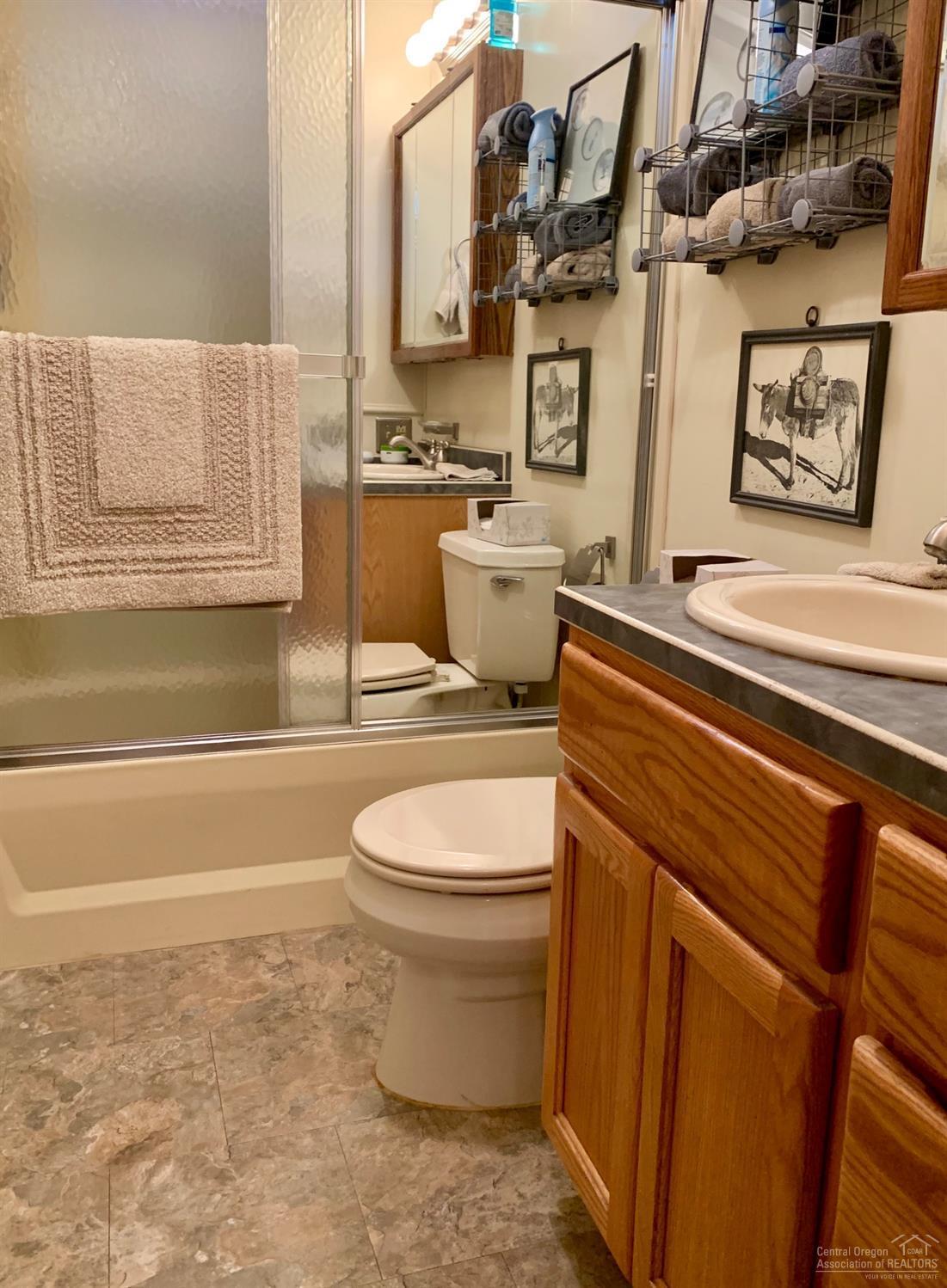 Guest bath with single vanity &amp; tub/