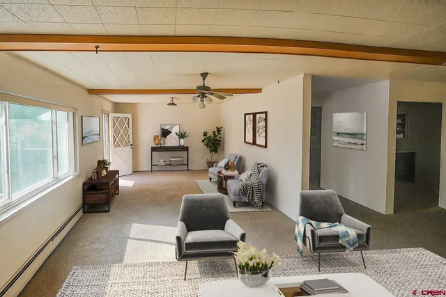 a view of a room with a large window