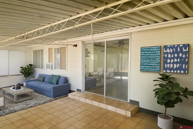 an empty room with wooden floor