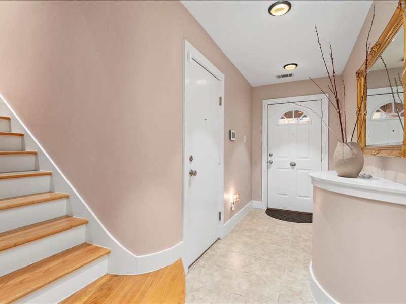 5941 South Loop E Freeway, Unit 504 Houston, TX 77033 - Photo 8 of 39 Beautiful foyer with custom installed hardwood treads on stairs.