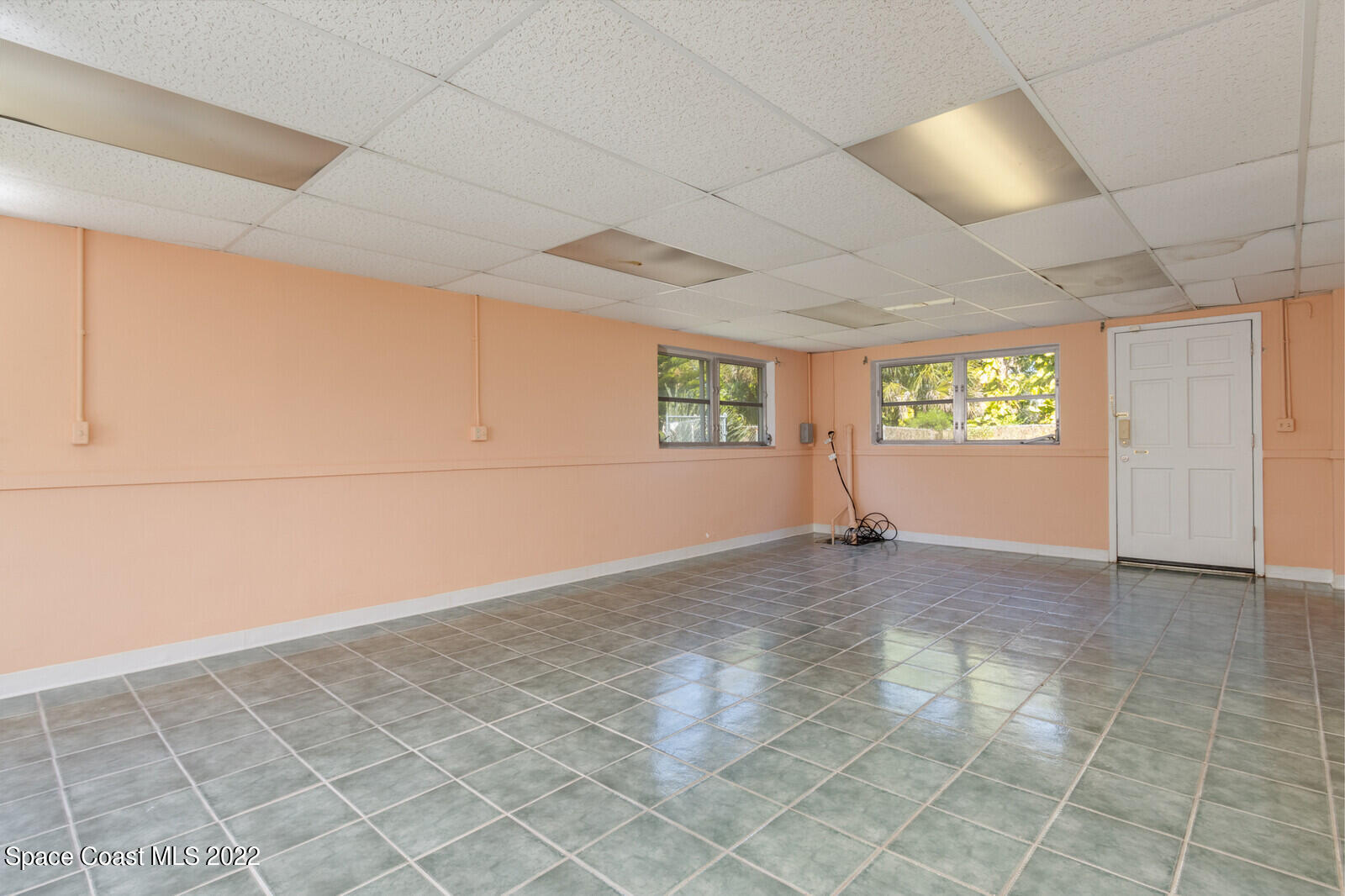 216 Dubber Road Melbourne, FL 32901 - Photo 23 of 39 an empty room with windows
