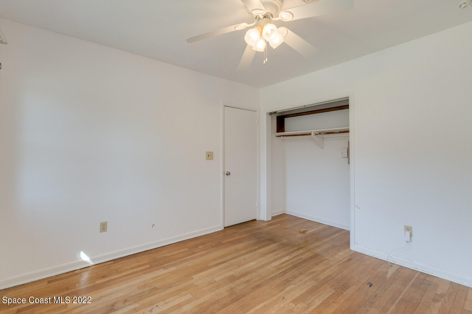 216 Dubber Road Melbourne, FL 32901 - Photo 29 of 39 wooden floor in an empty room