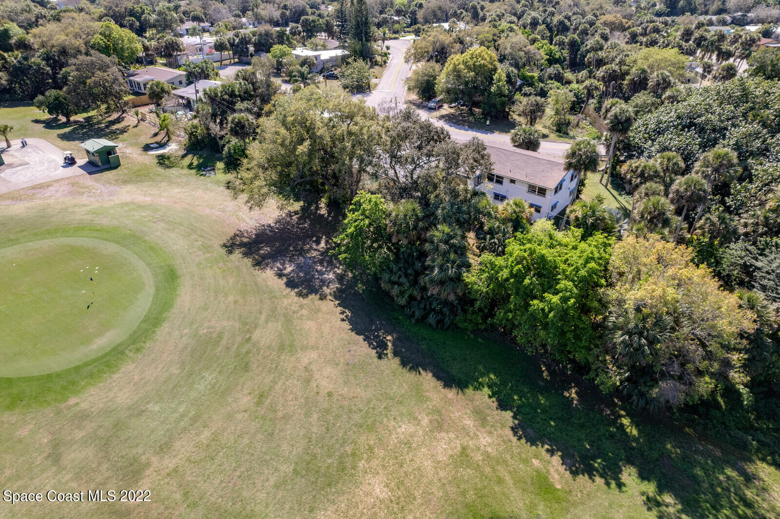 216 Dubber Road Melbourne, FL 32901 - Photo 33 of 39 a view of a lake with houses