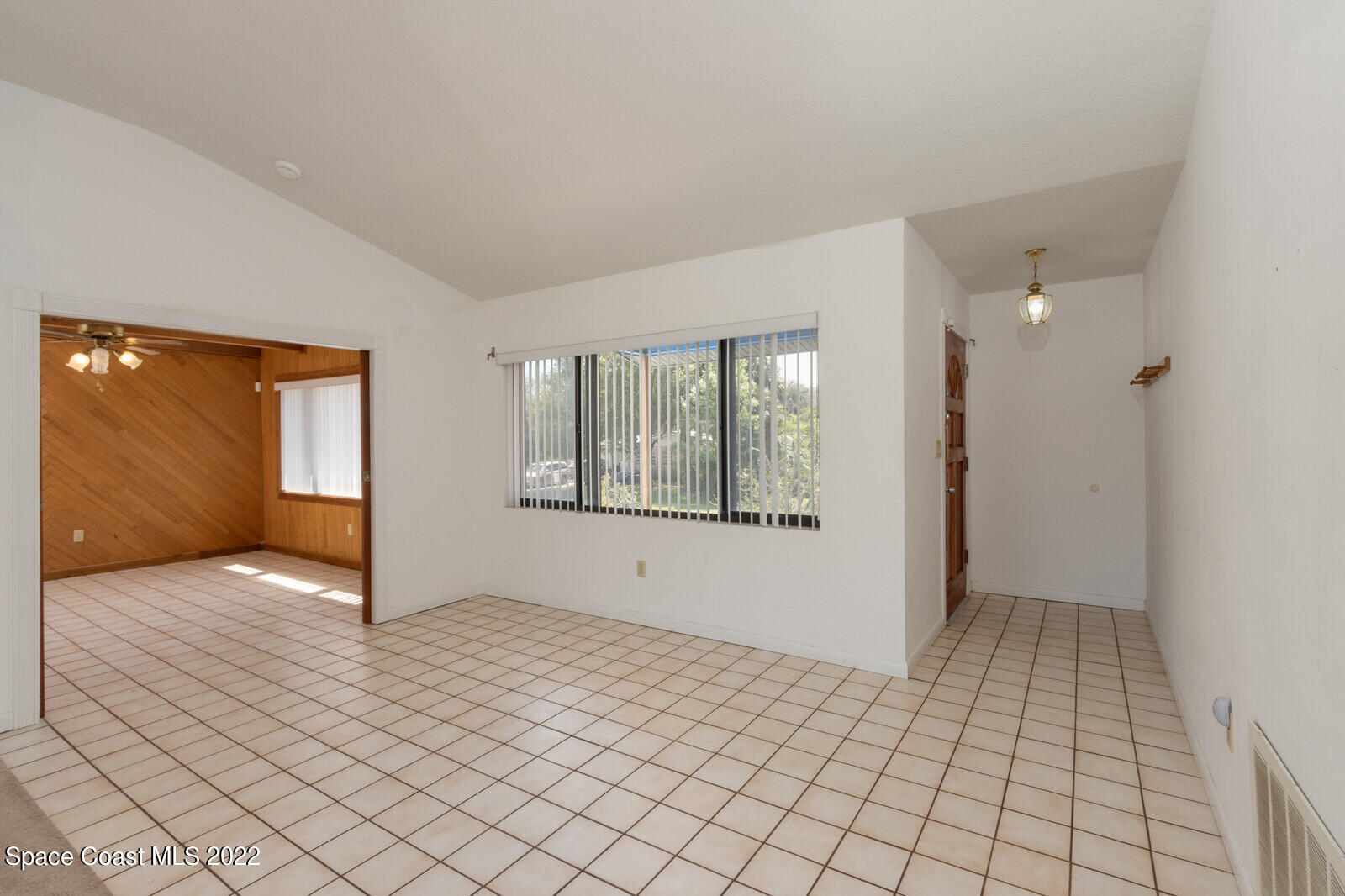 216 Dubber Road Melbourne, FL 32901 - Photo 4 of 39 a view of an empty room and window