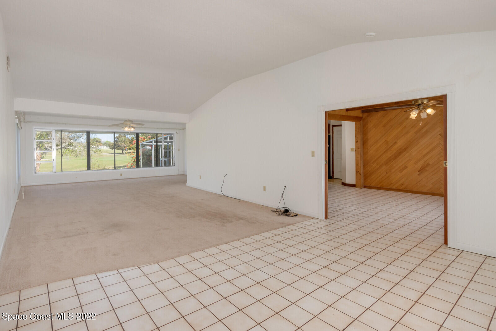 216 Dubber Road Melbourne, FL 32901 - Photo 5 of 39 a view of an empty room and window