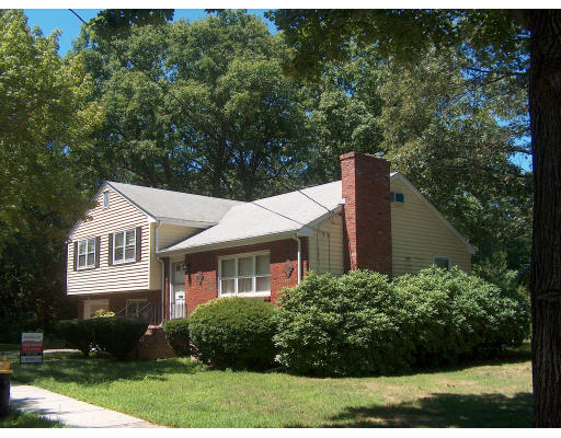 9 Deroma Road Boston, MA 02132 - Photo 1 of 1 a front view of a house with a yard and green space