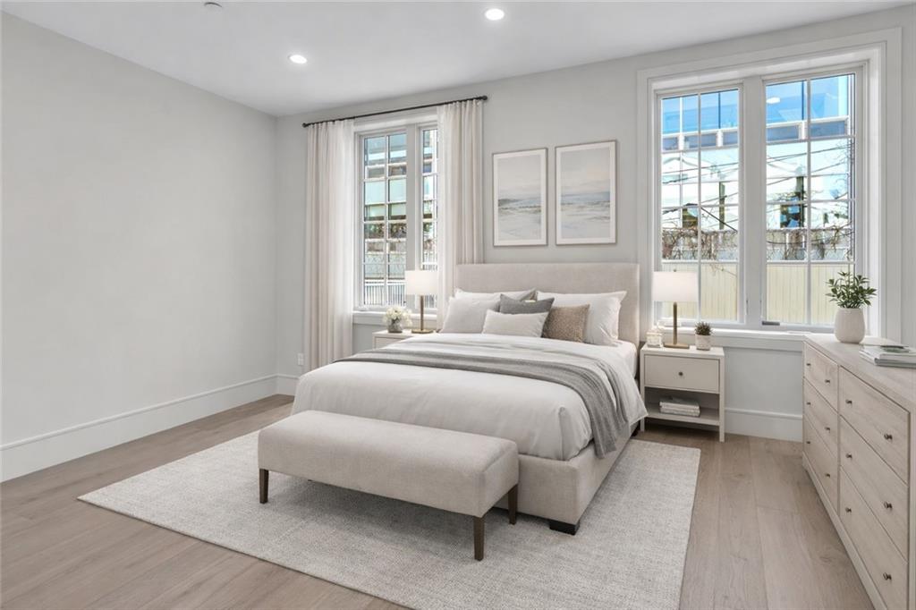 372 92nd Street, Unit 1B Brooklyn, NY 11209 - Photo 10 of 19 a spacious bedroom with a bed and a large window