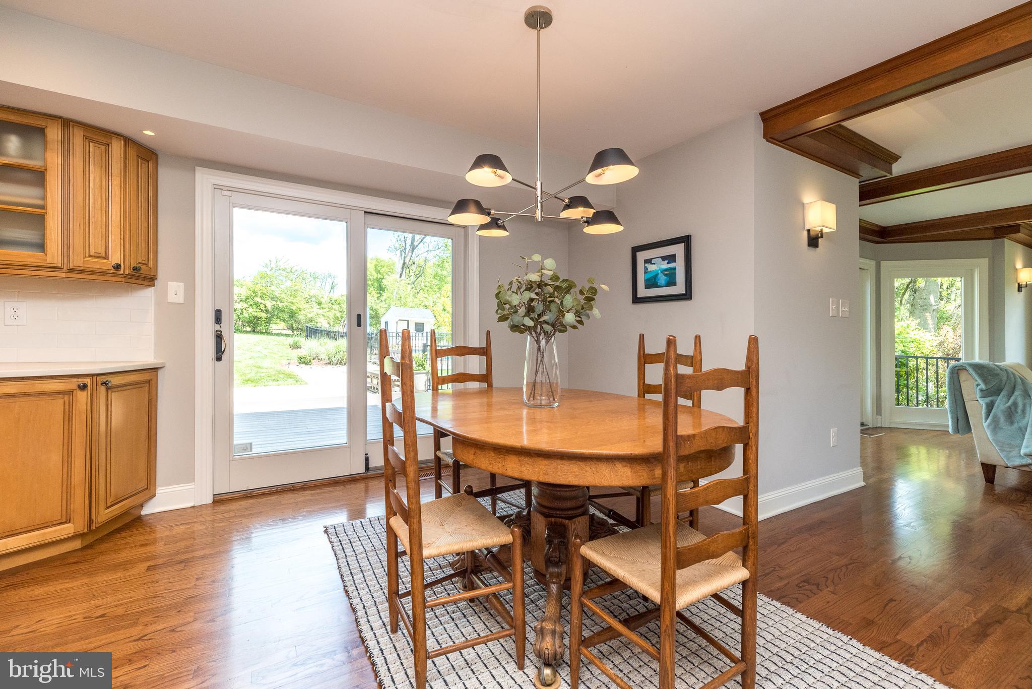 4976 Gloucester Drive Doylestown, PA 18902 - Photo 14 of 68 a view of a dining room with furniture window and wooden floor