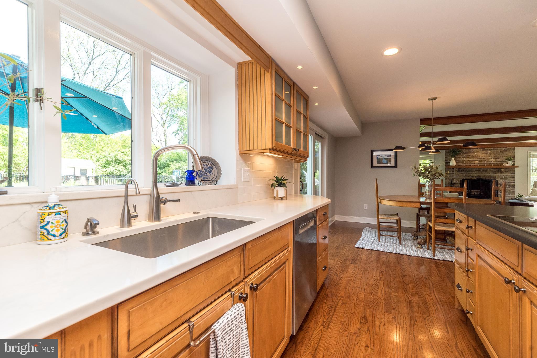 4976 Gloucester Drive Doylestown, PA 18902 - Photo 17 of 68 a kitchen with a sink a counter top space and stainless steel appliances