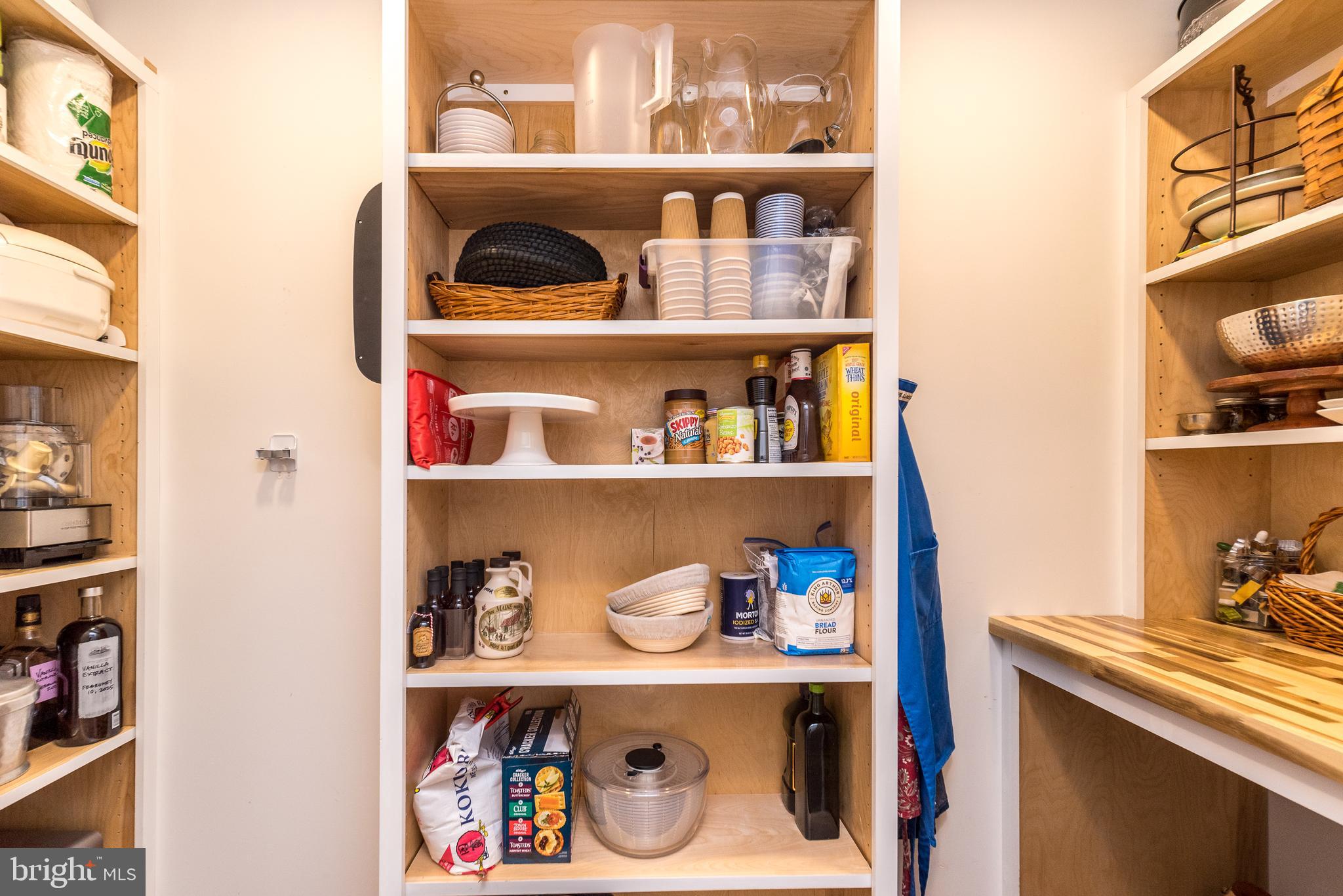 4976 Gloucester Drive Doylestown, PA 18902 - Photo 21 of 68 a shelf with books and knick knacks on it