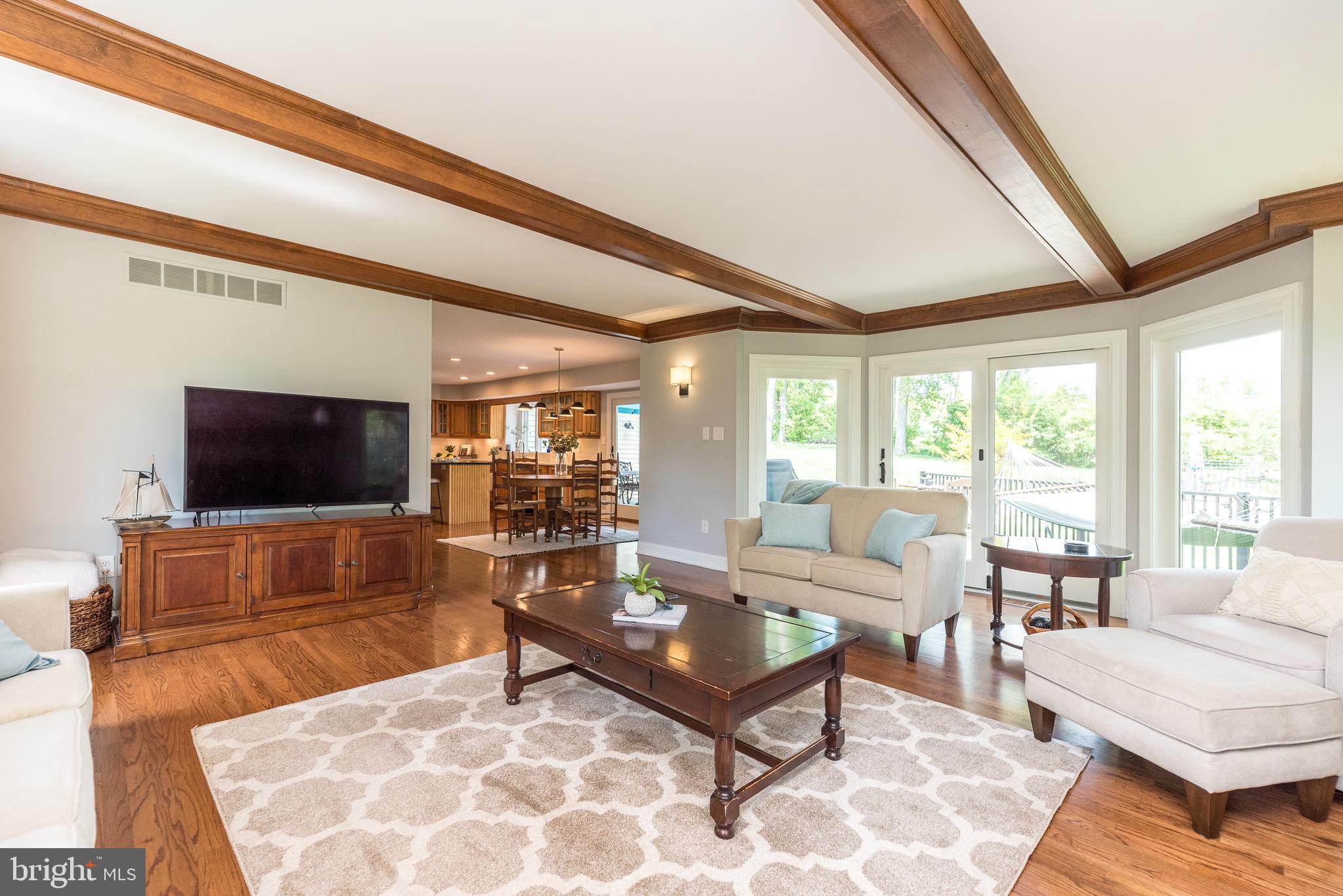4976 Gloucester Drive Doylestown, PA 18902 - Photo 25 of 68 a living room with furniture and a flat screen tv
