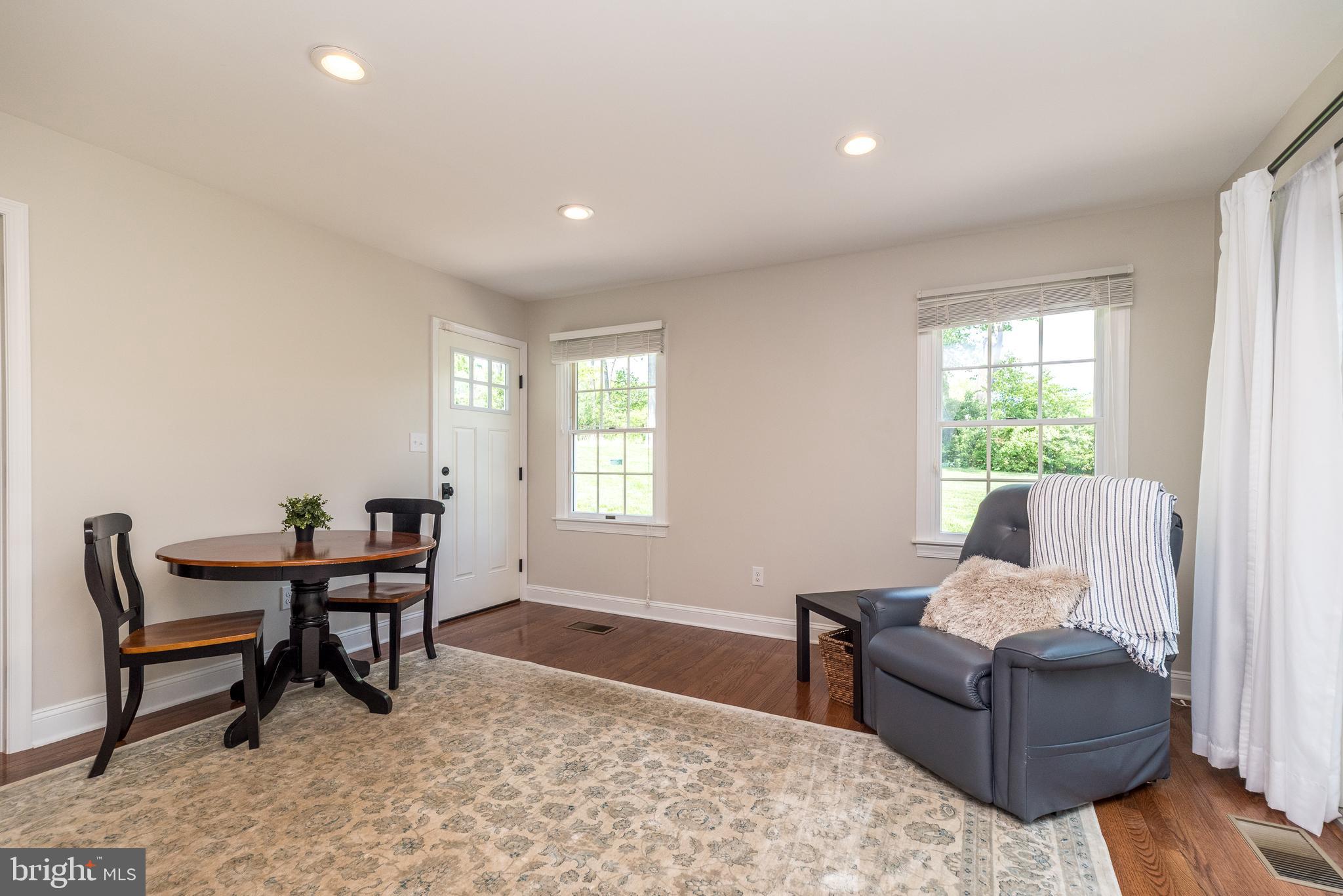 4976 Gloucester Drive Doylestown, PA 18902 - Photo 27 of 68 a living room with furniture and a window