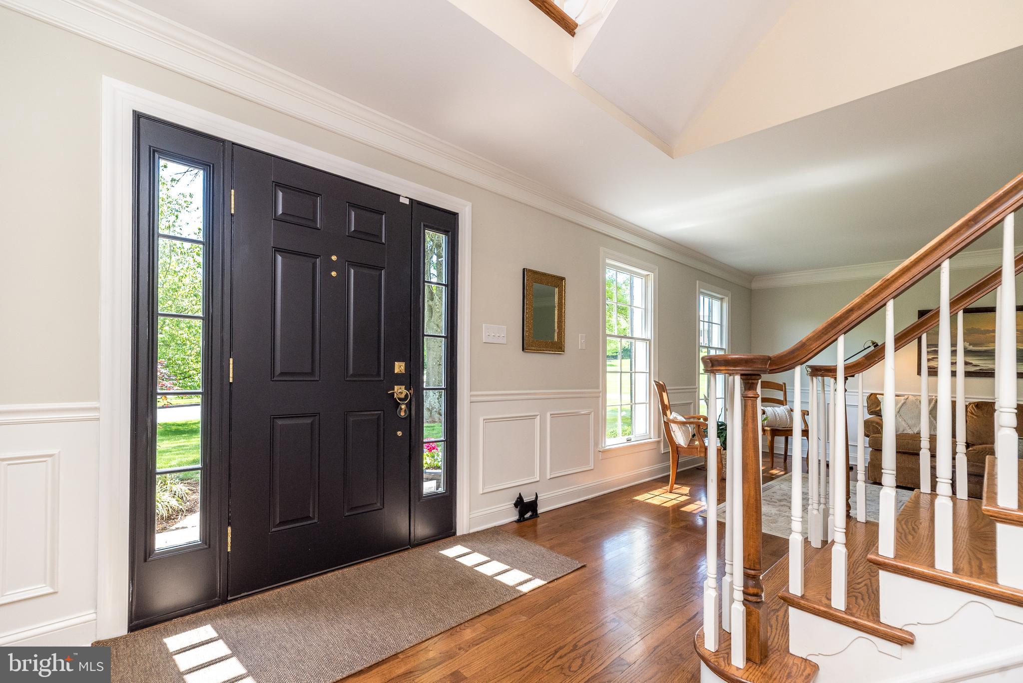 4976 Gloucester Drive Doylestown, PA 18902 - Photo 3 of 68 a view of entryway with wooden floor