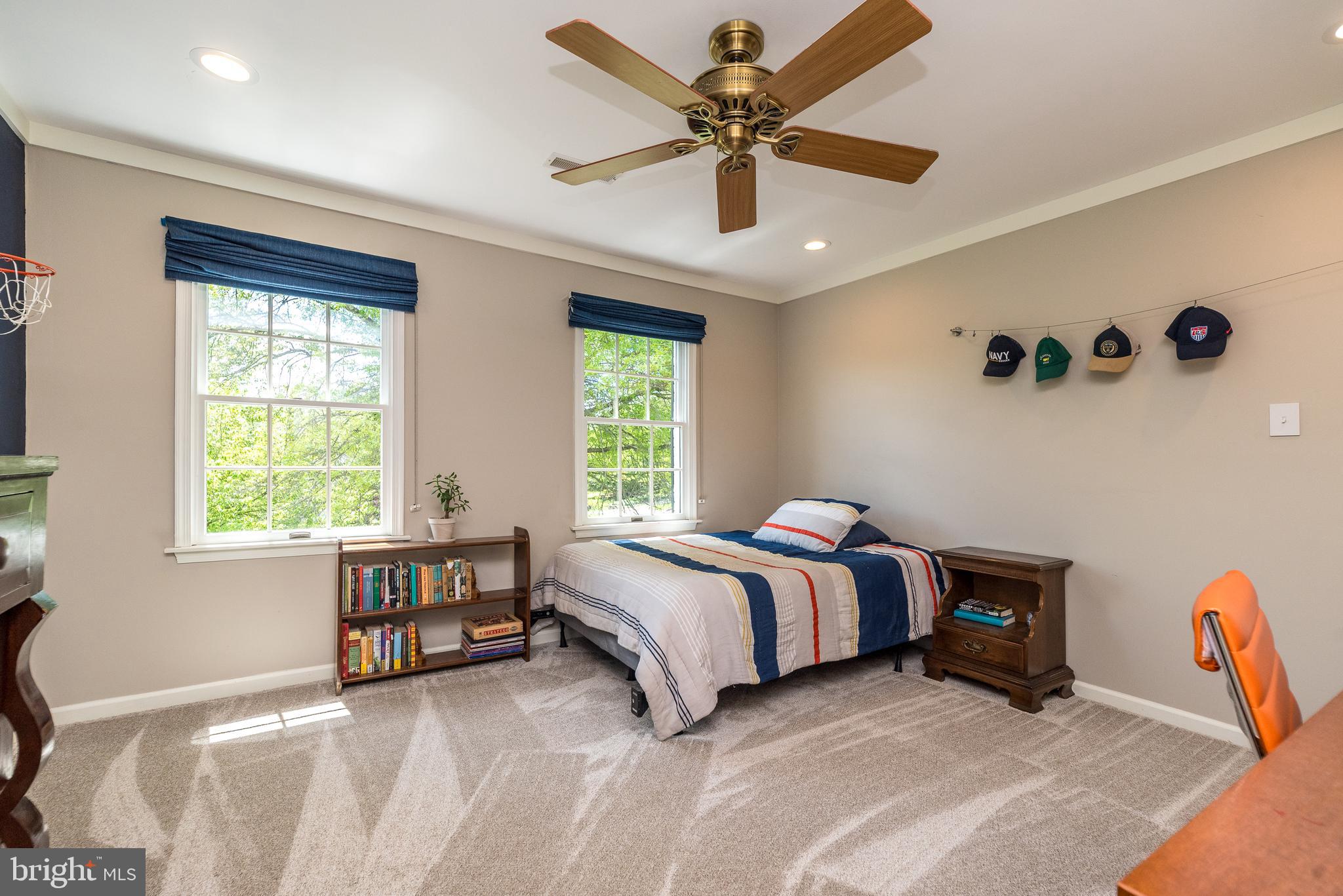 4976 Gloucester Drive Doylestown, PA 18902 - Photo 42 of 68 a spacious bedroom with a bed and a window