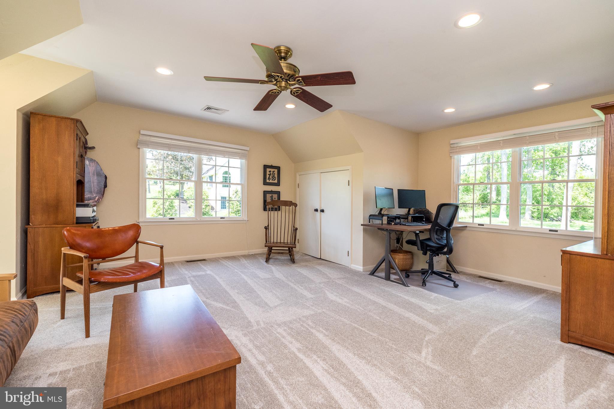4976 Gloucester Drive Doylestown, PA 18902 - Photo 45 of 68 a view of a livingroom with workspace and a window