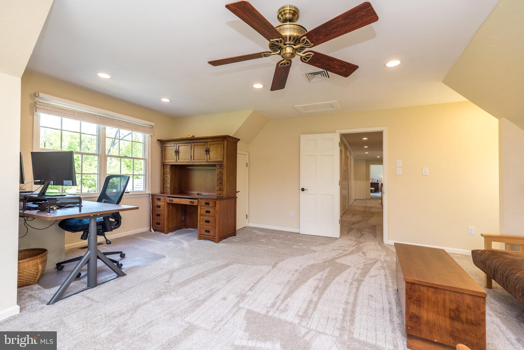 4976 Gloucester Drive Doylestown, PA 18902 - Photo 46 of 68 a view of a livingroom with workspace and a window