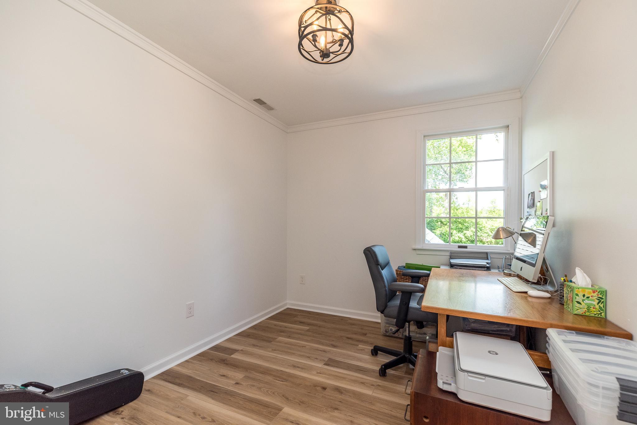 4976 Gloucester Drive Doylestown, PA 18902 - Photo 47 of 68 a view of a workspace with furniture and a window