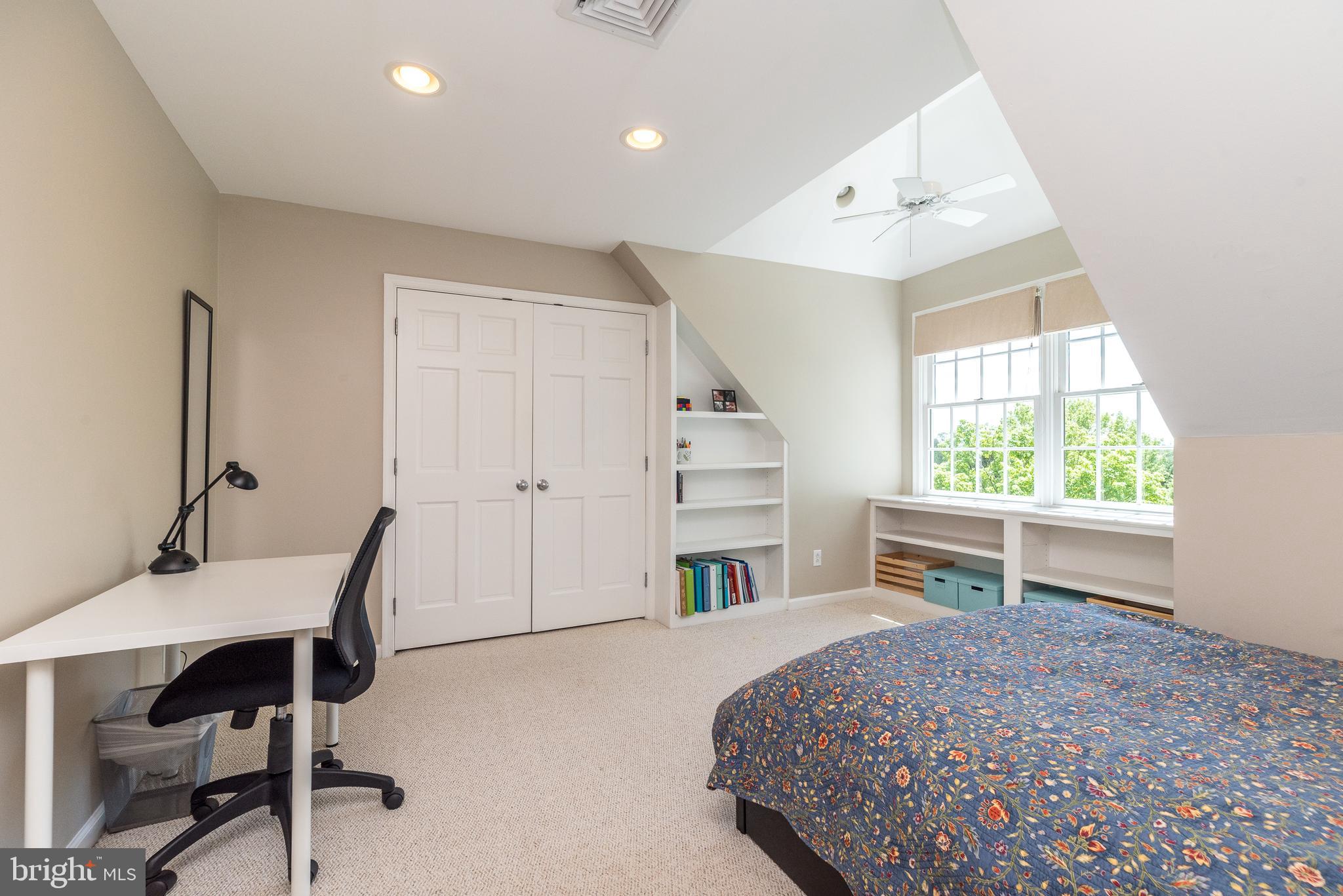 4976 Gloucester Drive Doylestown, PA 18902 - Photo 50 of 68 a bedroom with a bed and a desk