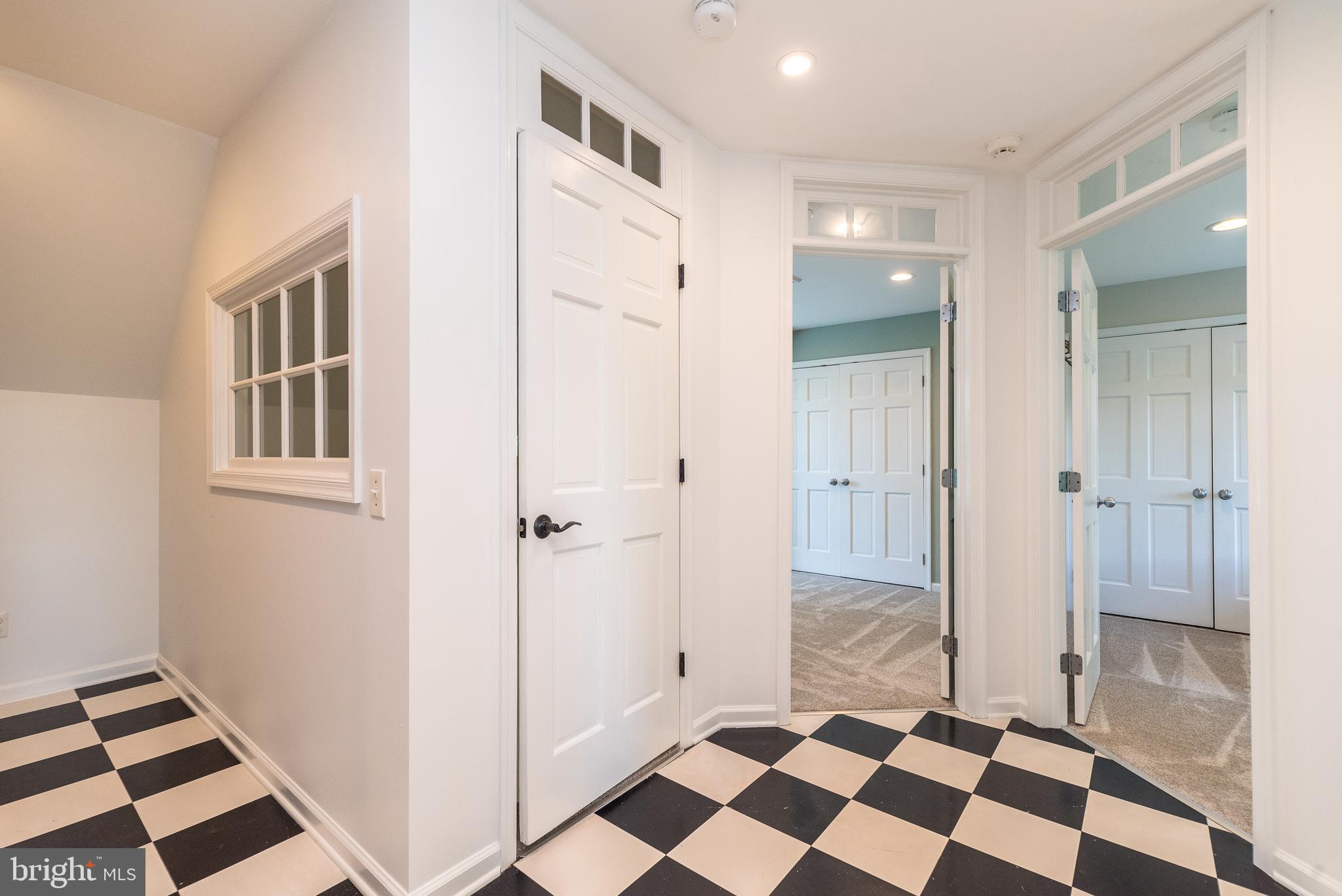 4976 Gloucester Drive Doylestown, PA 18902 - Photo 56 of 68 a view of a bathroom with a glass door shower and a bathtub