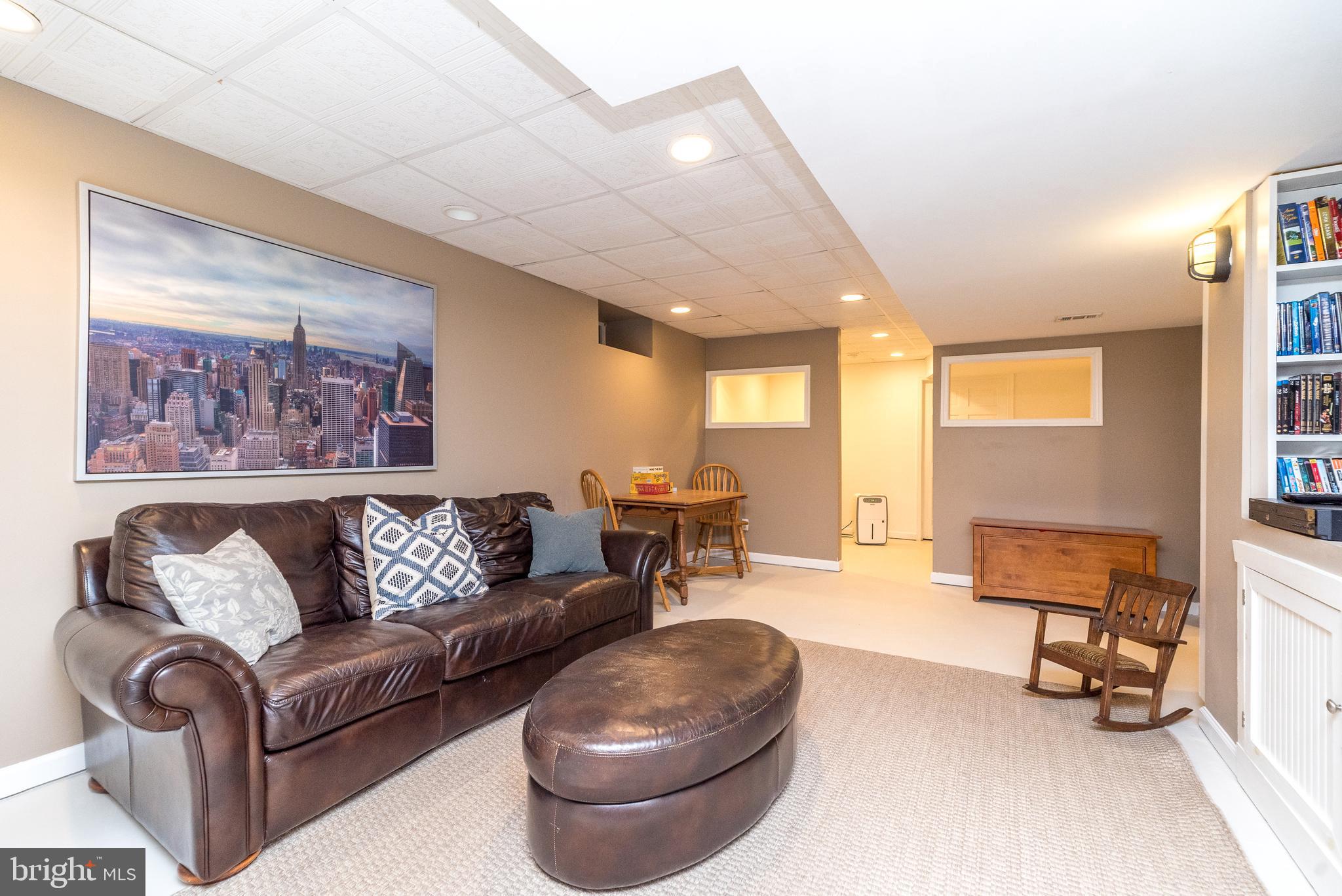4976 Gloucester Drive Doylestown, PA 18902 - Photo 58 of 68 a living room with furniture and a large window