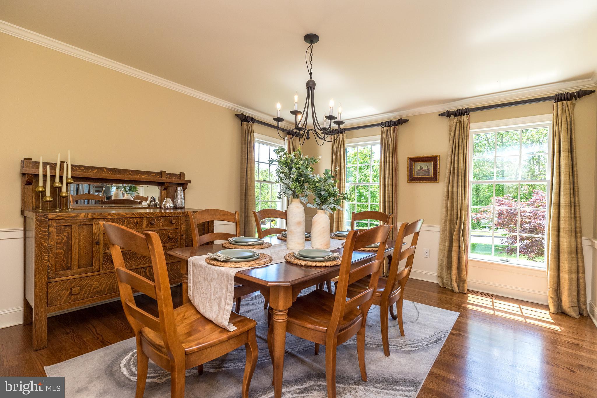 4976 Gloucester Drive Doylestown, PA 18902 - Photo 9 of 68 a view of a dining room with furniture window and wooden floor